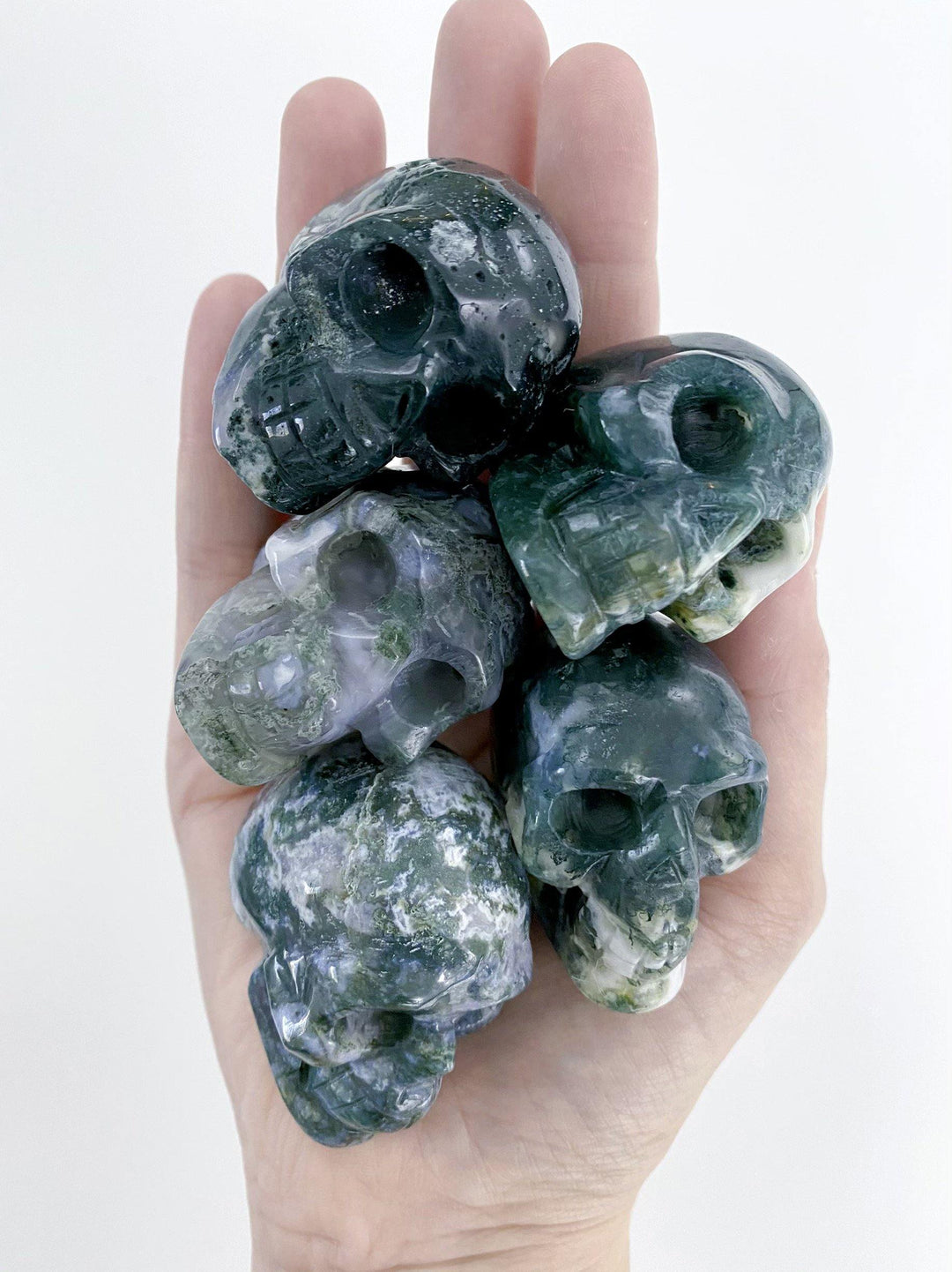 Moss Agate Carved Skulls - Uncommon Rocks