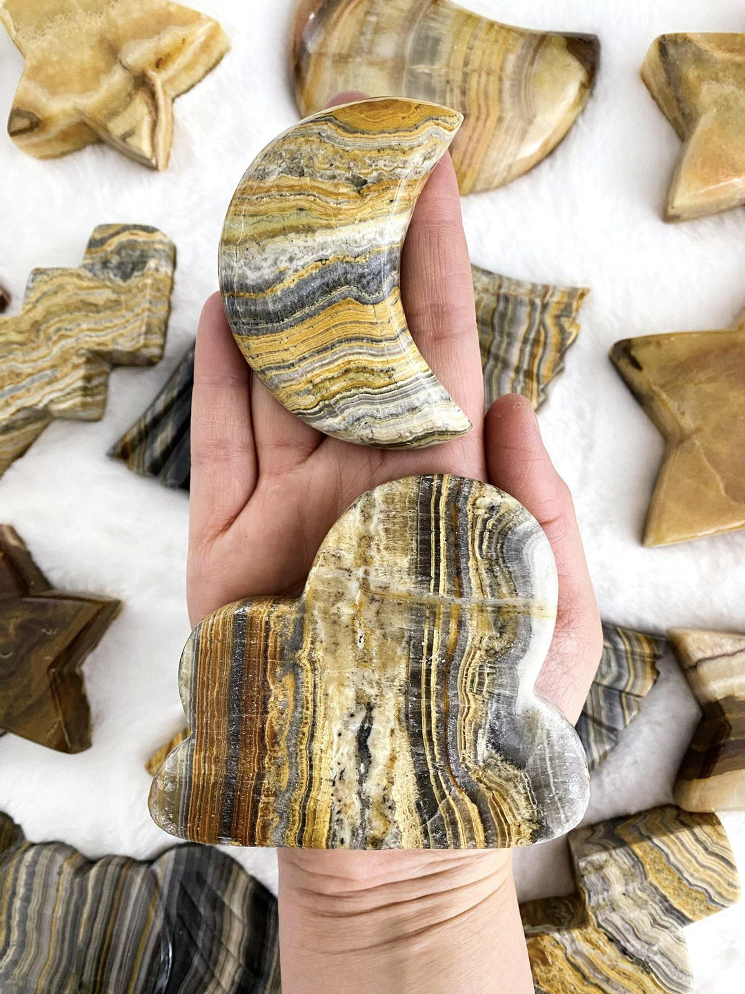 Banded Calcite Carved Moons and Clouds - Uncommon Rocks