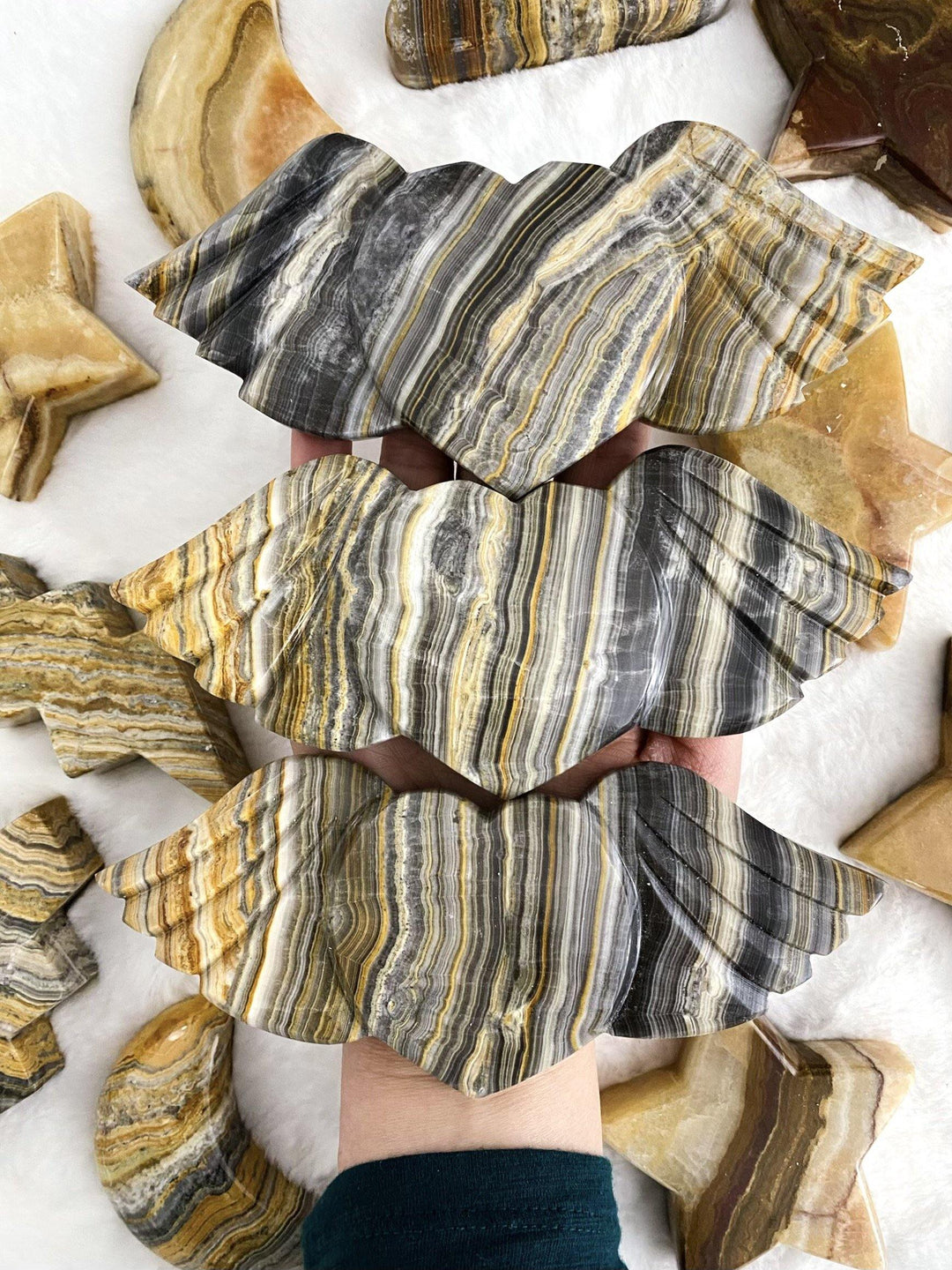 Banded Calcite Carved Heart with Wings - Uncommon Rocks