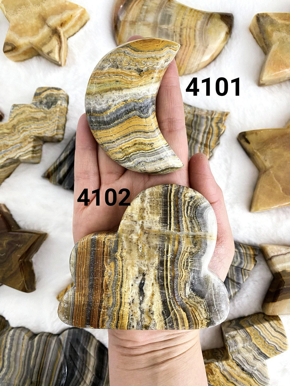Banded Calcite Carved Moons and Clouds - Uncommon Rocks