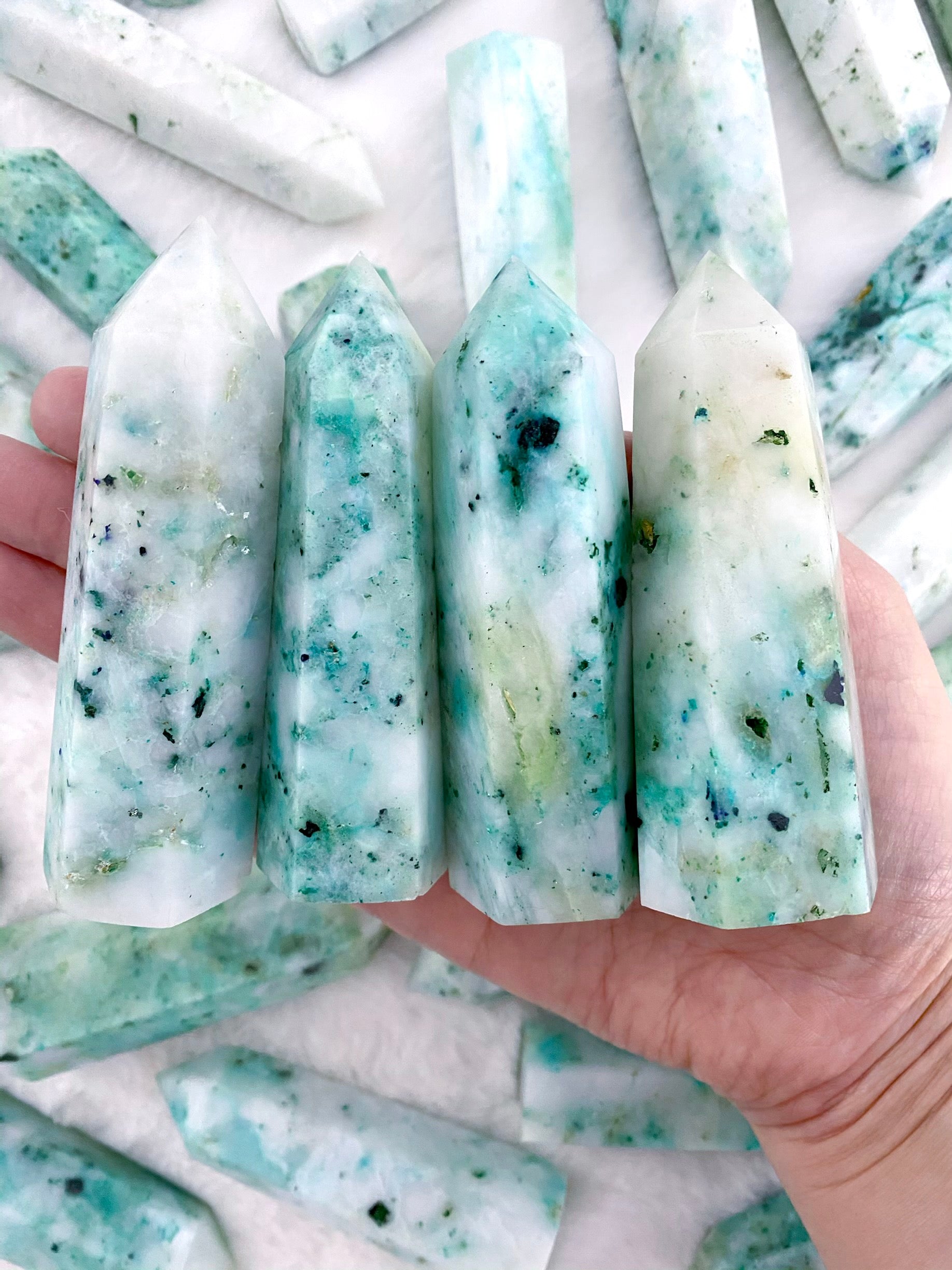 Chrysocolla in Quartz Towers – Uncommon Rocks