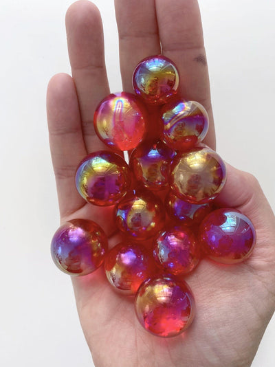 Aura Red Quartz Spheres - Uncommon Rocks