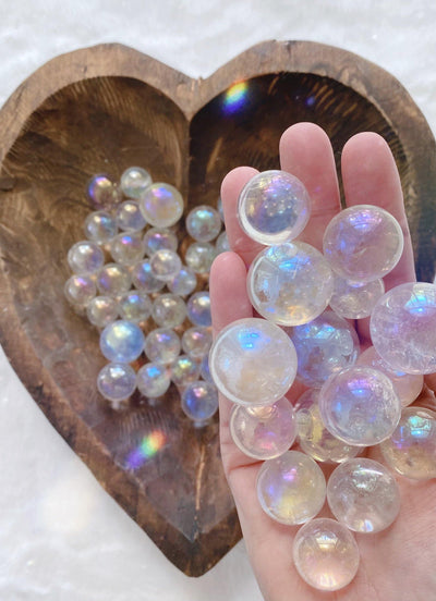Aura Clear Quartz Spheres - Uncommon Rocks